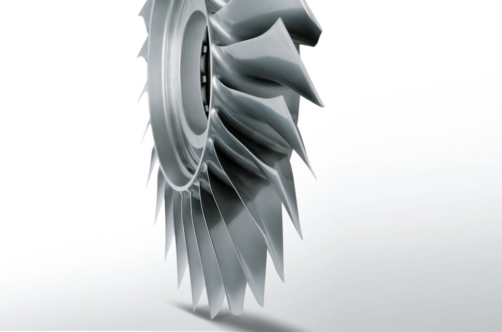 Metal component with curved blades