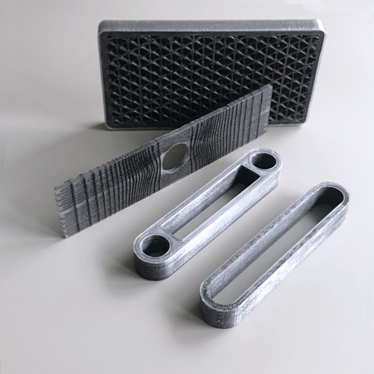 Exemples de pièces composites et structures en treillis imprimées par Anisoprint