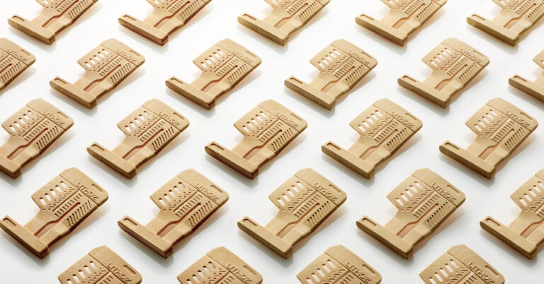 Series of Lithoz ceramic parts featuring channels and openings