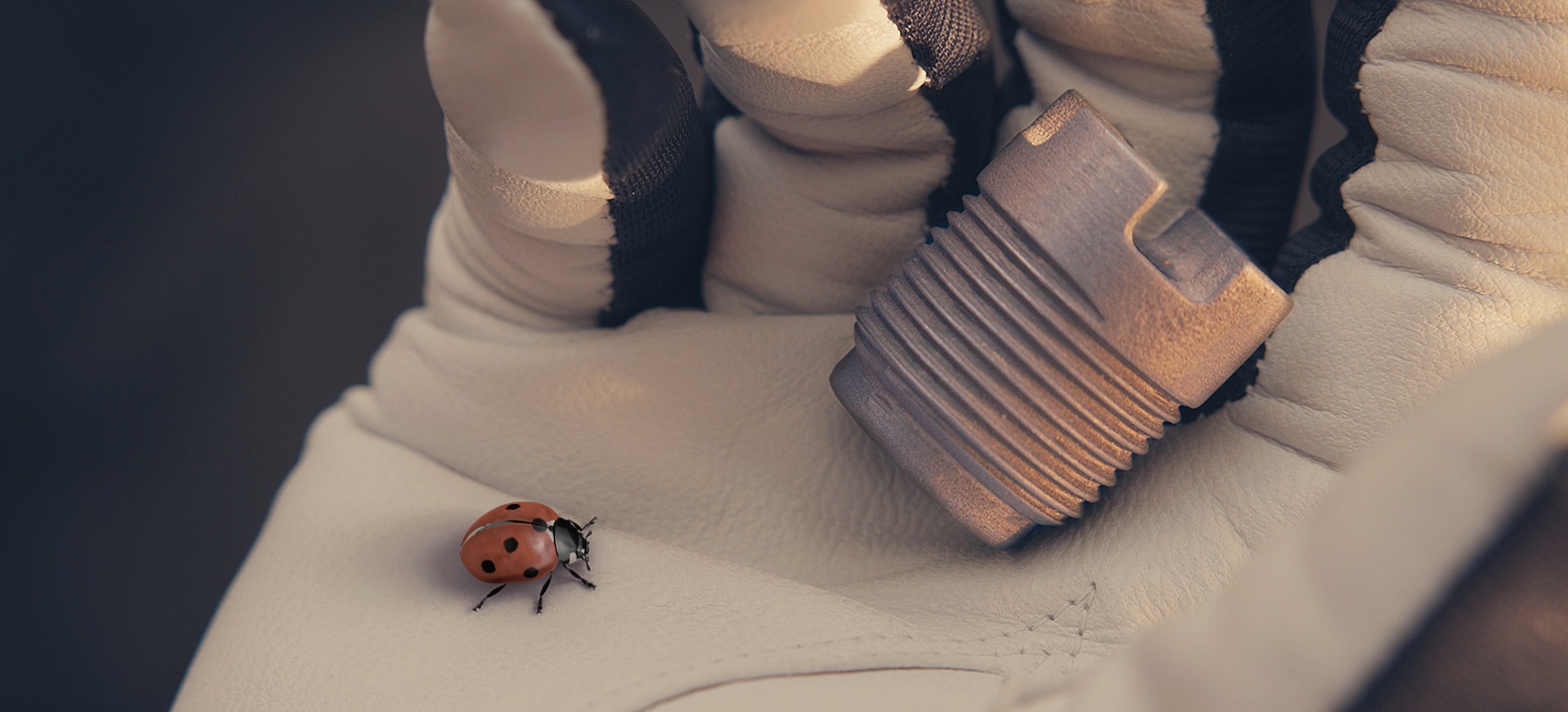 Cemented-carbide nozzle held in a gloved hand