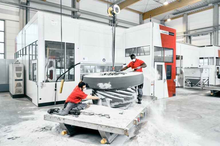 voxeljet equipment and sand molds in an industrial facility