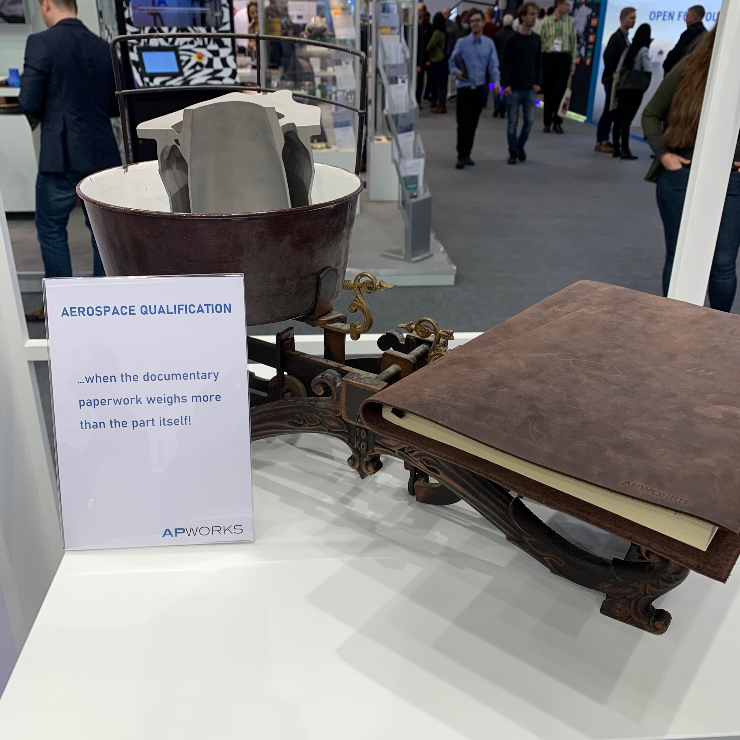 APWORKS metal components displayed at a trade show
