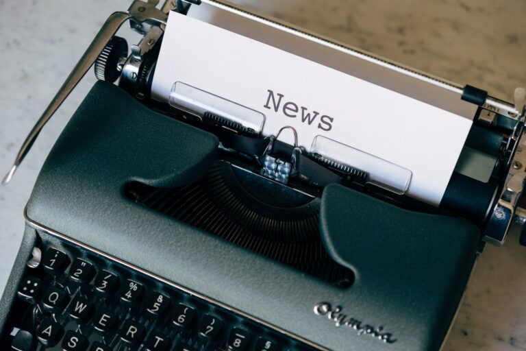 Typewriter holding a sheet with the word “News” — Markus Winkler / Unsplash