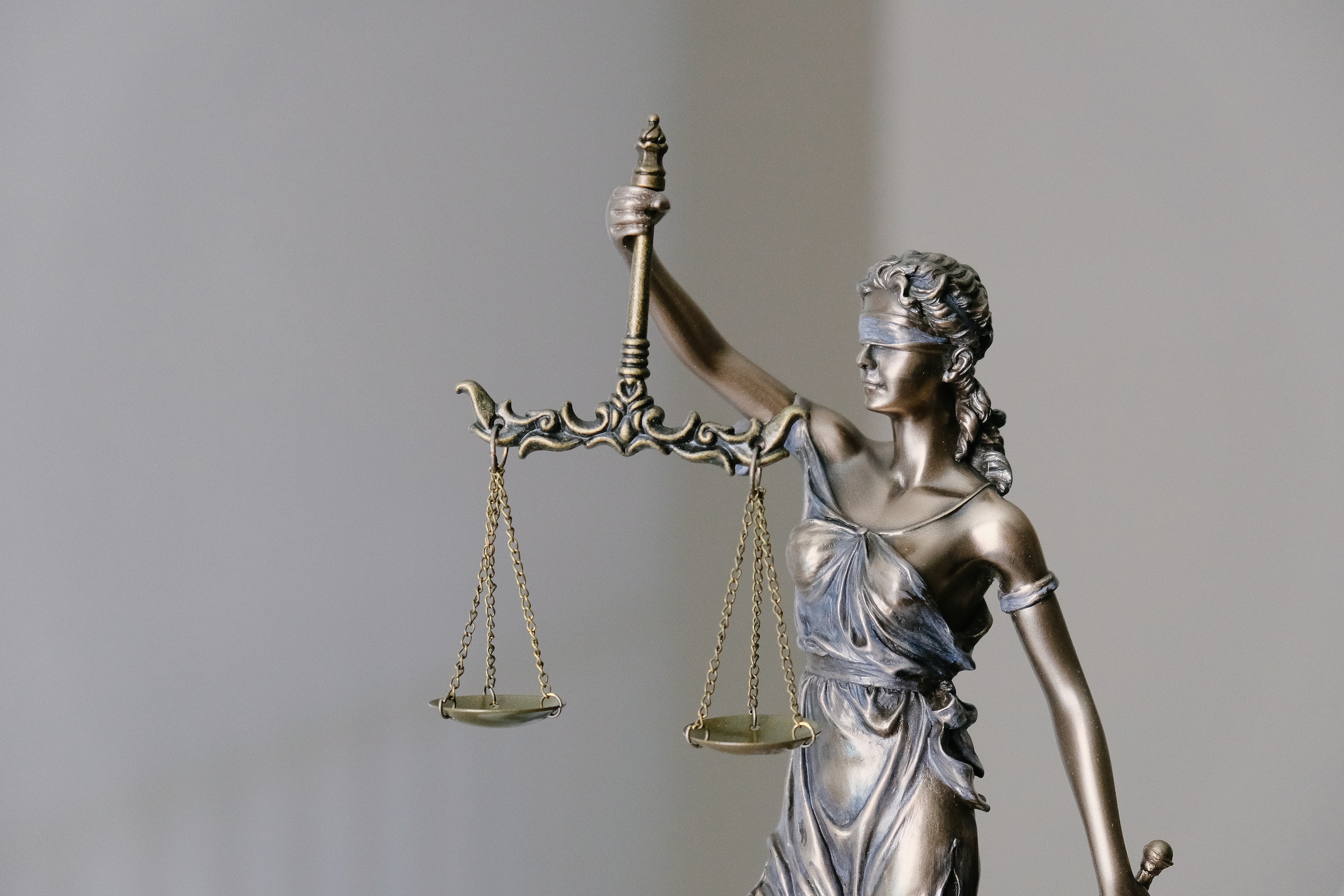 Statue of Justice holding scales