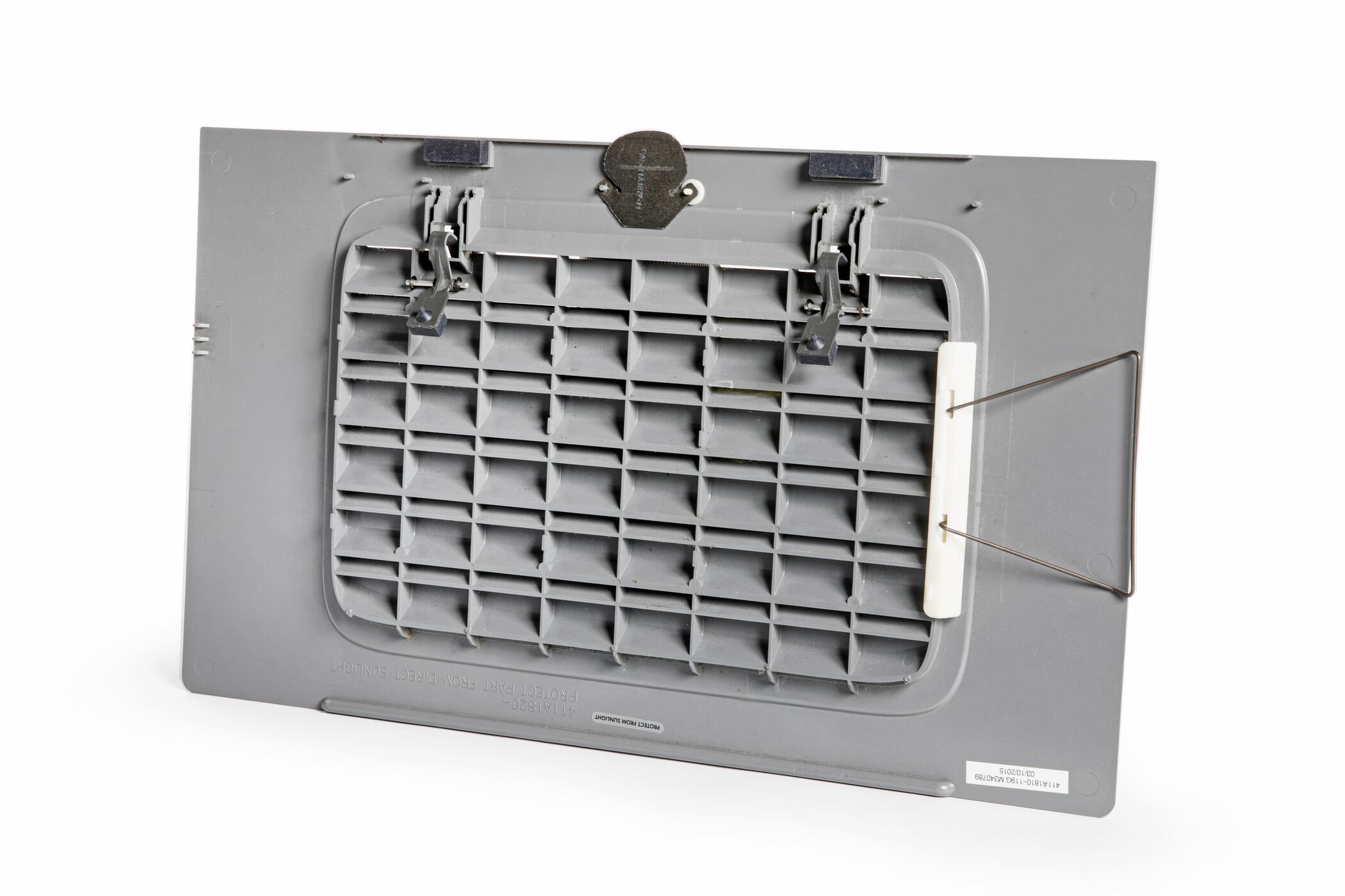 Ribbed rear face of a cabin panel with its fasteners
