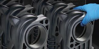 Anzu Partners acquires EnvisionTec, an expert in polymer 3D printers and resins A hand holds 3D printed parts