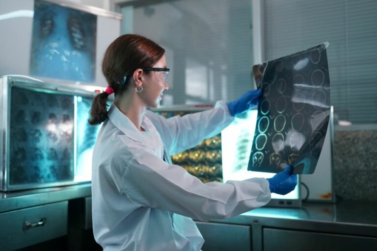 Illustration of a laboratory worker examining a digital anatomical display.