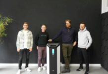 4 men with a machine