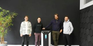 4 men with a machine