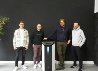 4 men with a machine
