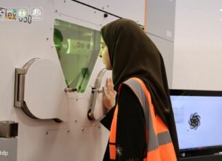 NAMI achieves 3 critical 3D printing milestones in Saudi Arabia Woman looking a print