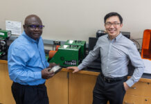 Turning spoiled milk into 3D printing material? UW-Platteville professors show how. Two men in front of a 3D printer
