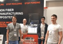 Team of 4 people on a booth