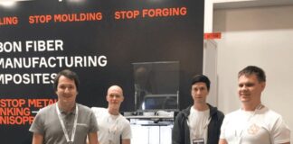 Team of 4 people on a booth