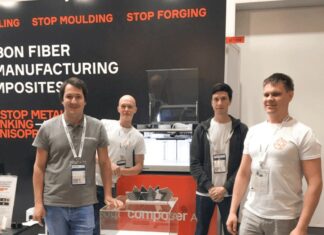 Team of 4 people on a booth