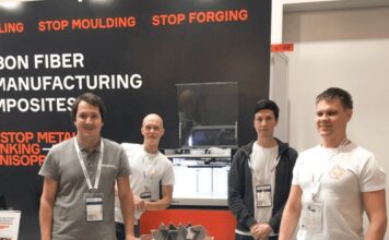 Team of 4 people on a booth