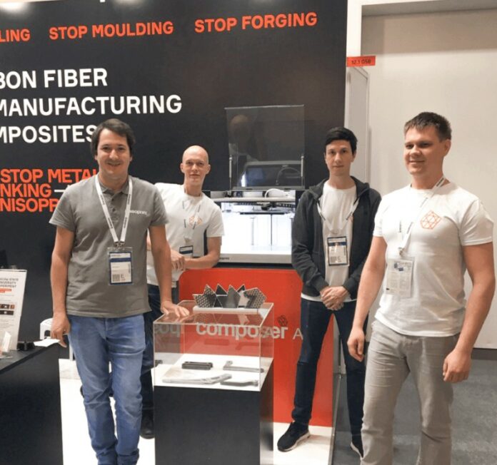 Team of 4 people on a booth