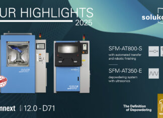 Image featuring 2 automated depowdering machines