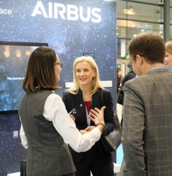 4 people networking at an event