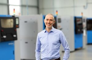 Man in front of a machine
