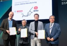 group of people showcasing a contract