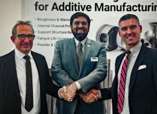 Three men signing a MoU