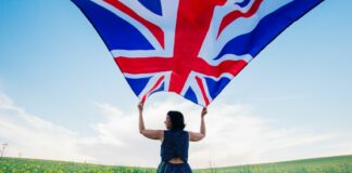woman-holding-the-british-flag-outdoors