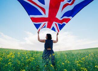 woman-holding-the-british-flag-outdoors
