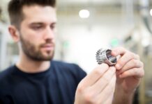 Man looking at a puzzle