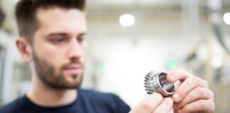 Man looking at a puzzle