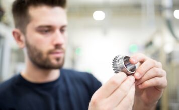 Man looking at a puzzle