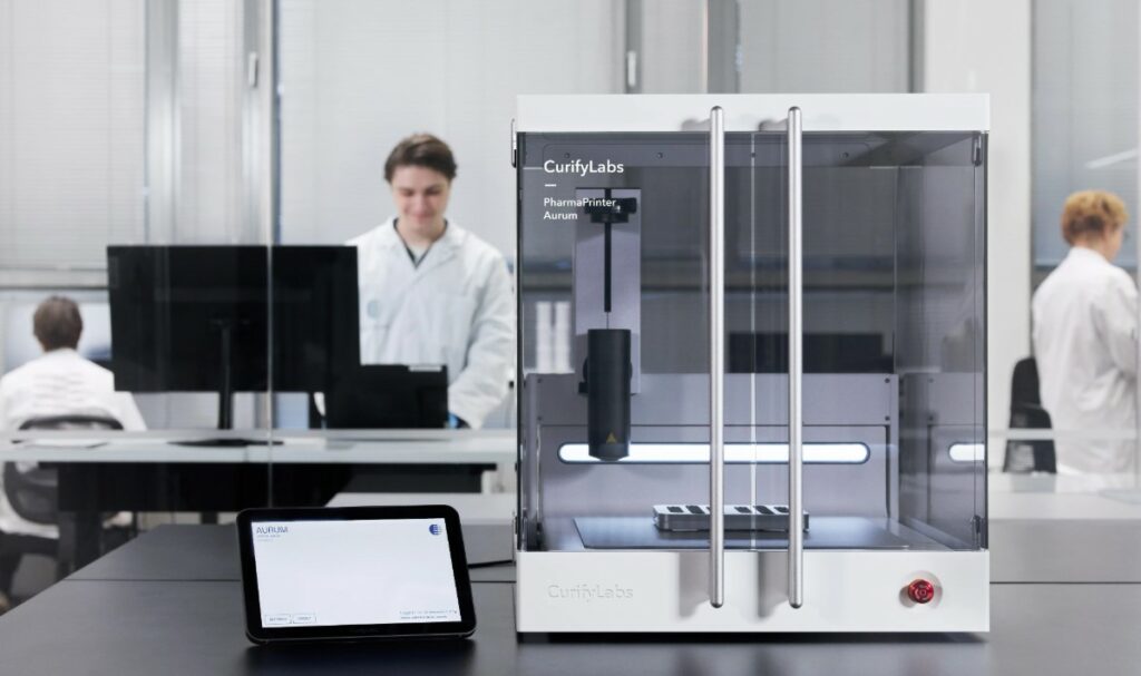 CurifyLabs equipment and personnel in a laboratory.