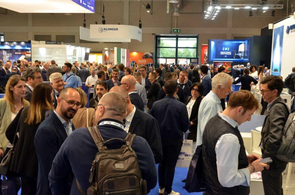 Group of people discussing at an event