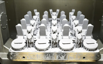 AlSi10Mg parts, printed on the NXG XII 600 system, depowdered in the SFM-AT1000-S by Solukon