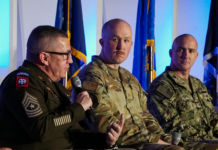 Panel of 4 men at a military event