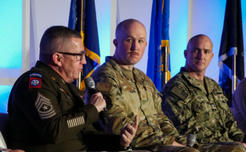 Panel of 4 men at a military event