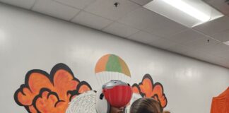 Sailor trying a 3D printed visor