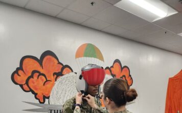 Sailor trying a 3D printed visor