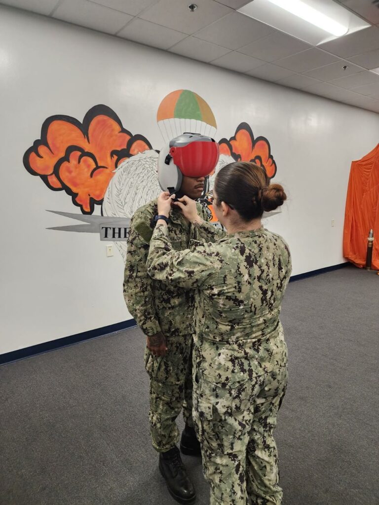 Sailor trying a 3D printed visor