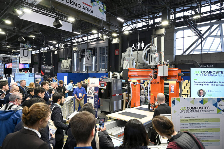 People gathering around a live demo