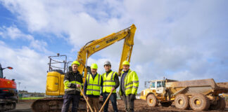 A group of 4 men on a construction site