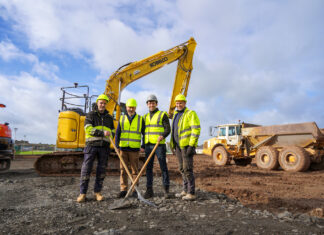 A group of 4 men on a construction site