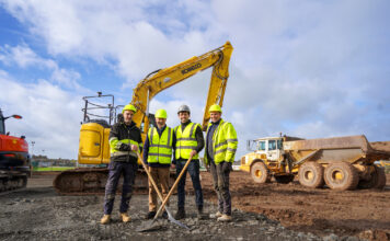 A group of 4 men on a construction site