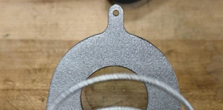 On-orbit deployment by NASA JPL and Proteus Space shows AM simplifies deployable structures Close-up of the additively manufactured titanium deployment spring inside the JPL Additive Compliant Canister (JACC), highlighting the integrated mechanism design made possible by additive manufacturing.