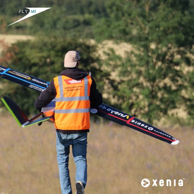 O.L.I.V.I.A. fixed-wing drone carried by a team member