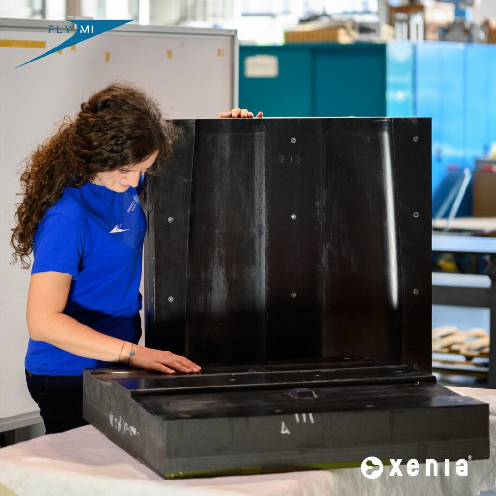 Fly-Mi team member inspecting a composite mould