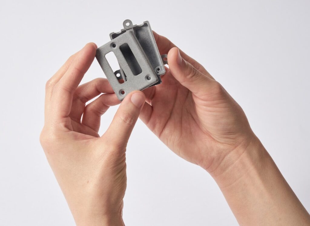 3D printed part held by someone