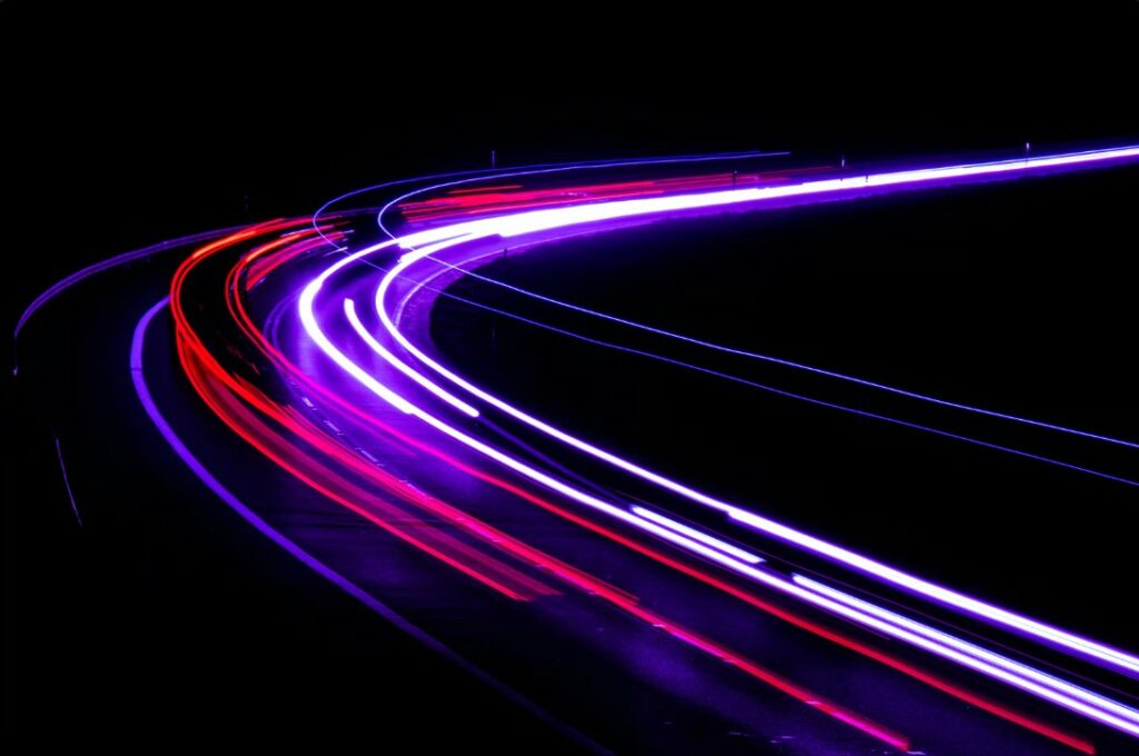 Abstract light trails illustrating digital workflows