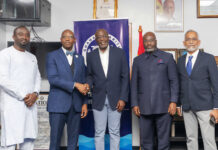 A group of men shaking hands