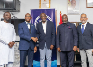 A group of men shaking hands